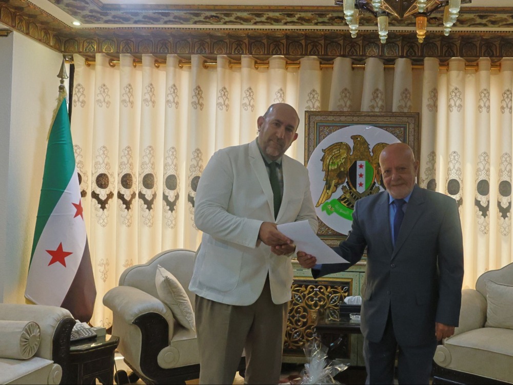 اسامة القاضي ووزير الاقتصاد