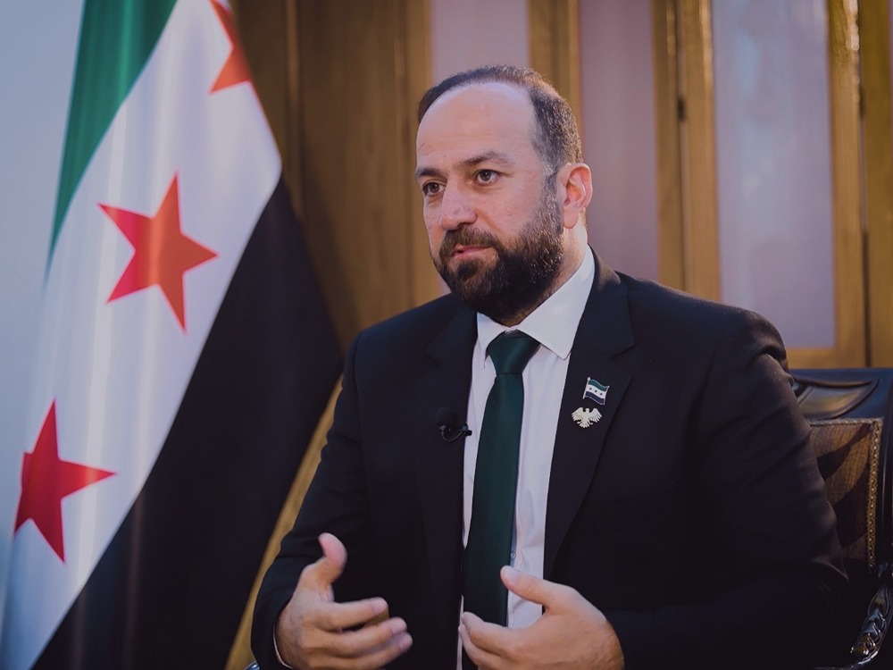 Minister of Information Hamza Mustafa