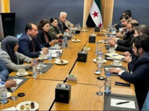 جلسة مفاوضات سابقة بين الحكومة وقسد