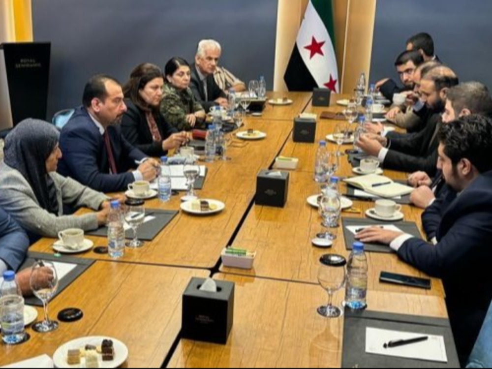 جلسة مفاوضات سابقة بين الحكومة وقسد