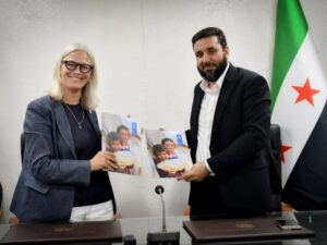 نائب وزير الاقتصاد ماهر خليل الحسن والمديرة القطرية لبرنامج الأغذية العالمي ماريان ورد
