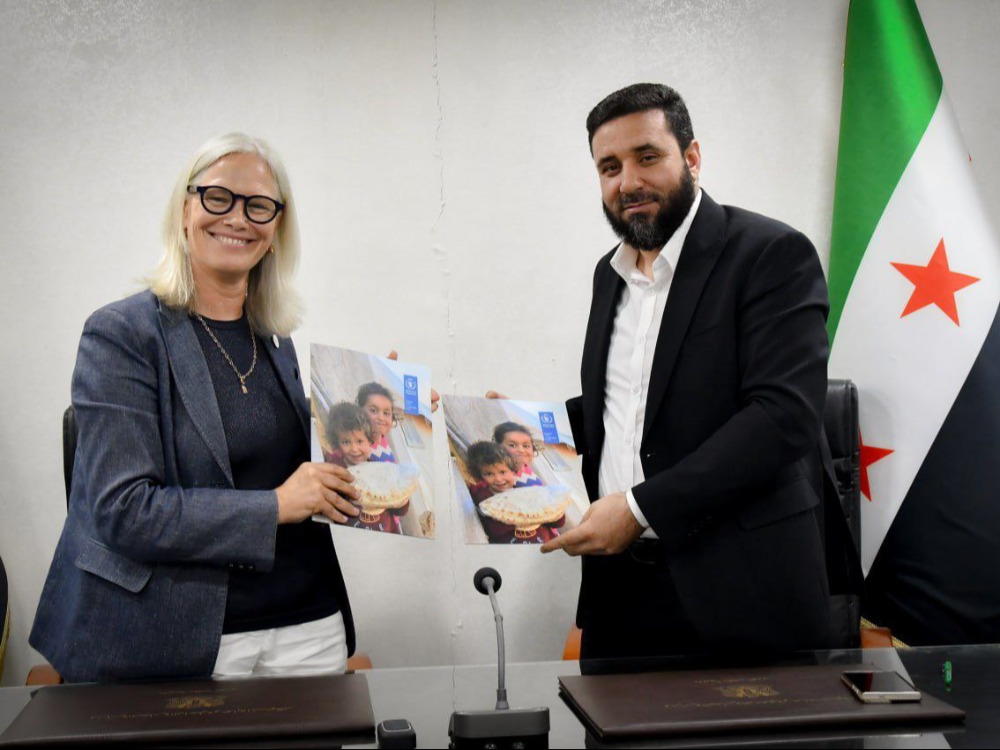 نائب وزير الاقتصاد ماهر خليل الحسن والمديرة القطرية لبرنامج الأغذية العالمي ماريان ورد