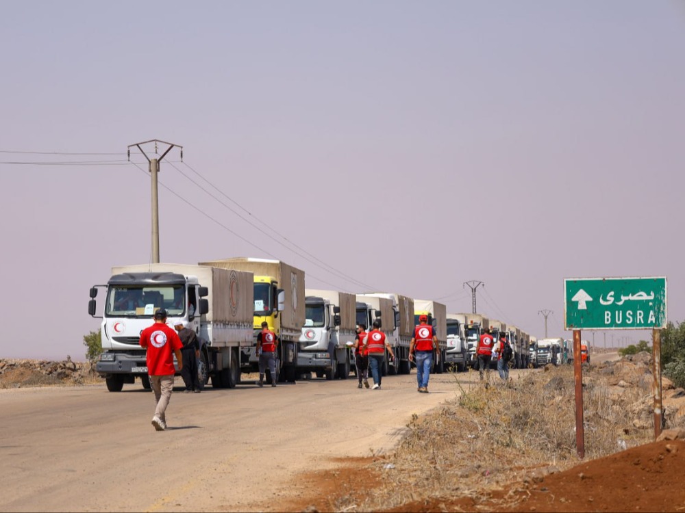 الهلال الأحمر: إدخال 450 طن طحين إلى السويداء