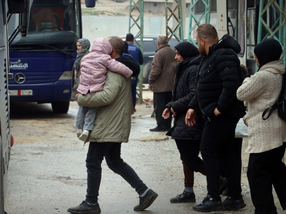 حلب.. انطلاق الدفعة الثانية من قافلة العودة إلى حيّي الأشرفية والشيخ مقصود