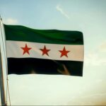 الأمن الداخلي في حلب: إسقاط العلم الوطني خلال احتفالات نوروز فعلٌ مخالف للقانون