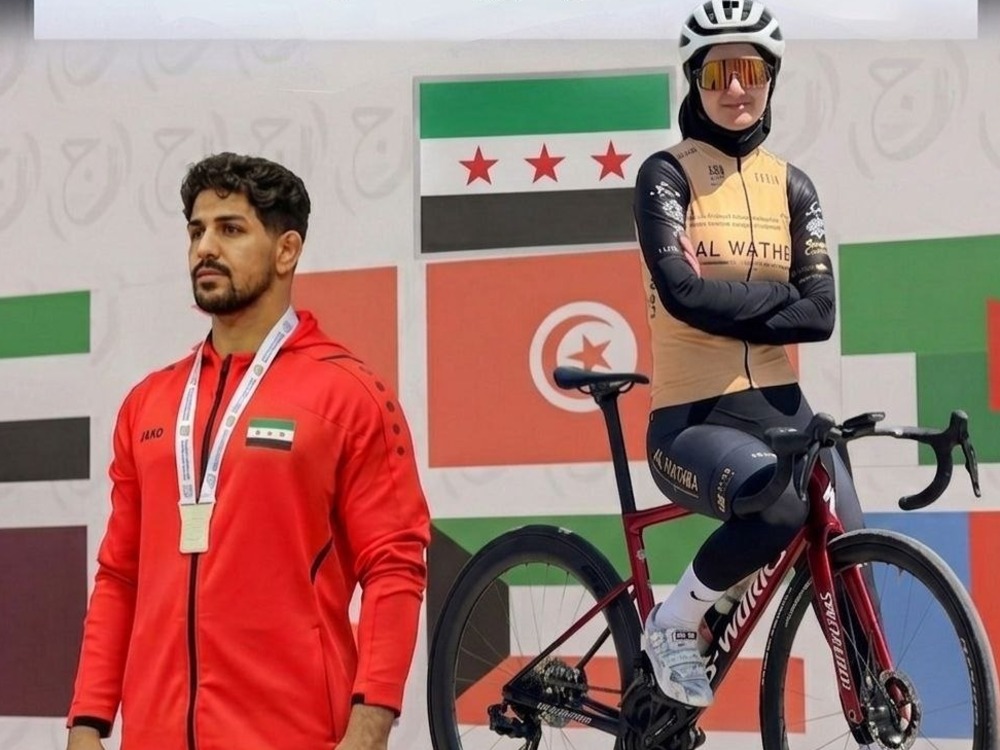 الأسطة والفارس يرفعان العلم السوري في افتتاح دورة ألعاب البحر المتوسط