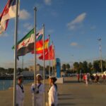 مراسم رفع العلم السوري بحضور أعضاء البعثة السورية في القرية الرياضية بتارانتو