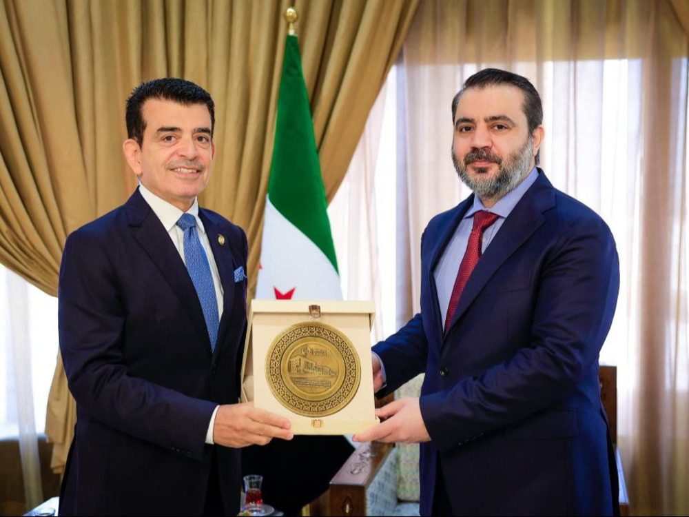 The Minister of Foreign Affairs with the Director-General of the Organization of the Islamic World