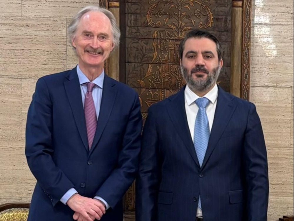 The Syrian Foreign Minister and the UN envoy